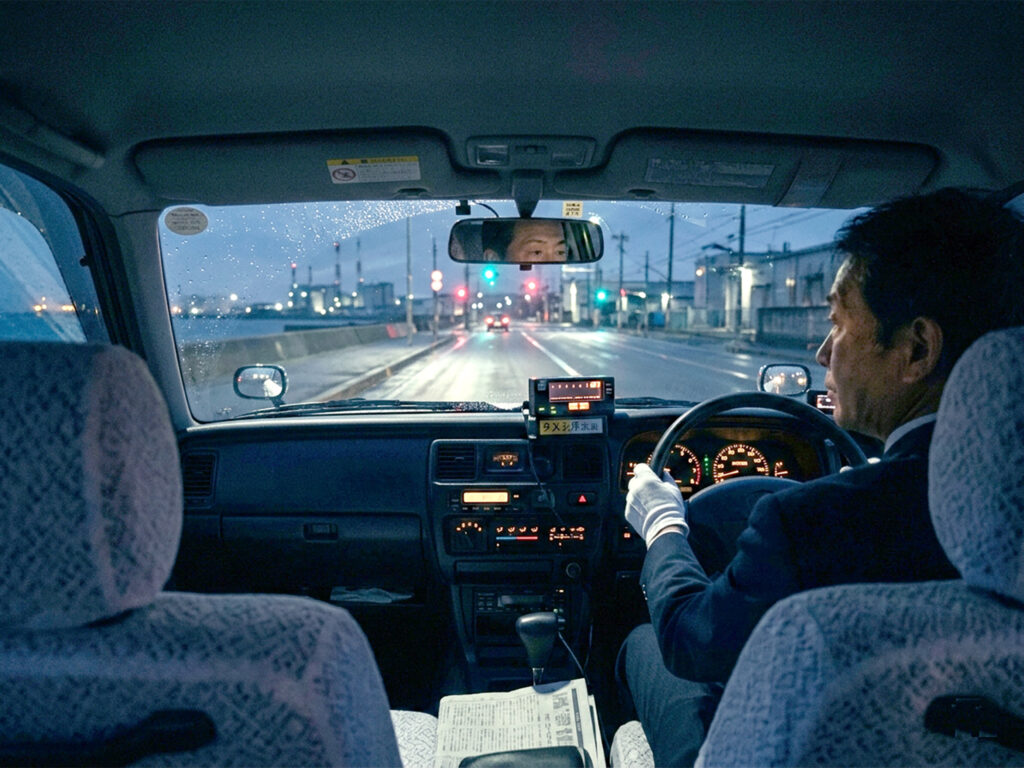 Coastal driving view from inside a taxi in Japan